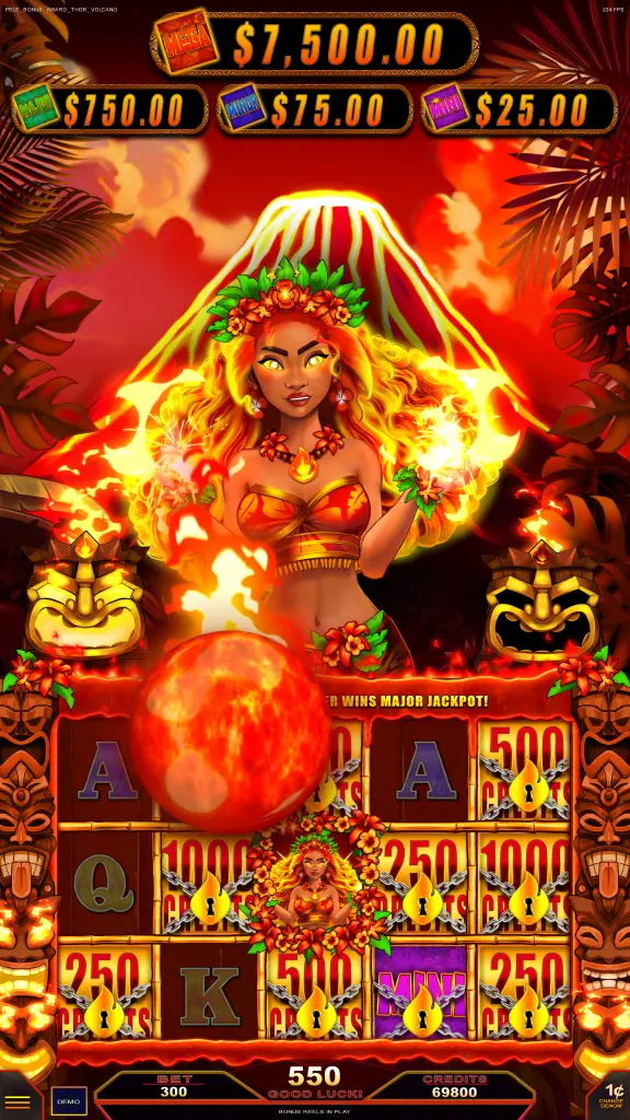 A vibrant slot machine screen with a fiery goddess, volcano, and lava. Jackpot amounts are shown at the top; reels display symbols like letters, numbers, and the goddess. Bright red and orange dominate the color palette.